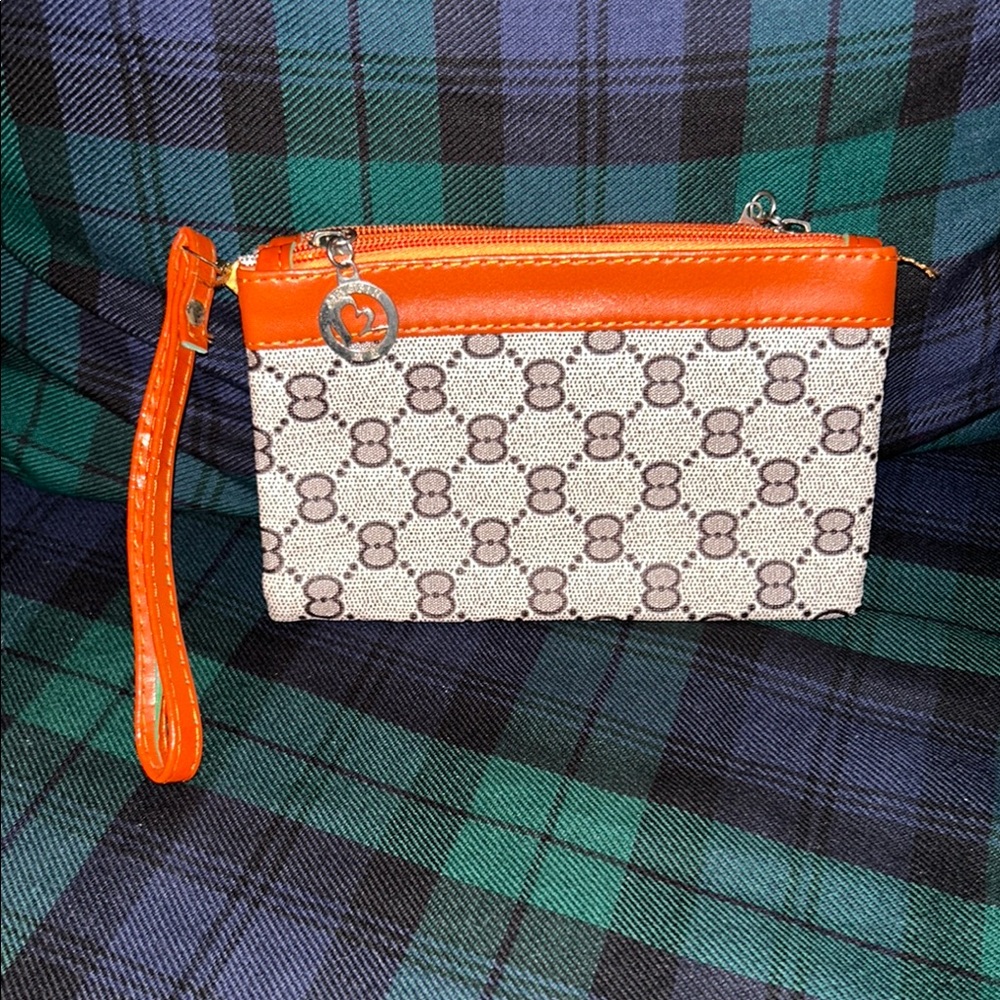 Dooney & Bourke Orange and Cream Clutch Wristlet